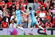 MANCHESTER, ENGLAND - SEPTEMBER 10: Kevin De Bruyne of Manchester City celebrates scoring his sides first goal with Nolito of Manchester City during the Premier League match between Manchester United and Manchester City at Old Trafford on September 10, 2016 in Manchester, England.  (Photo by Clive Brunskill/Getty Images)